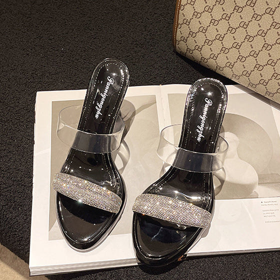 Transparente, hochhackige Hausschuhe mit Strasssteinen