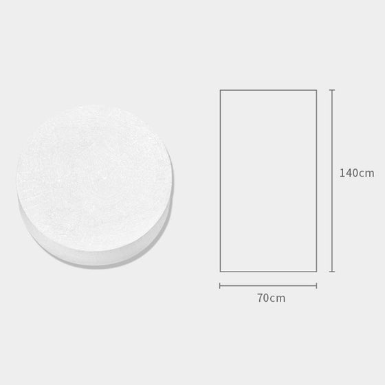 Komprimiertes Badetuch