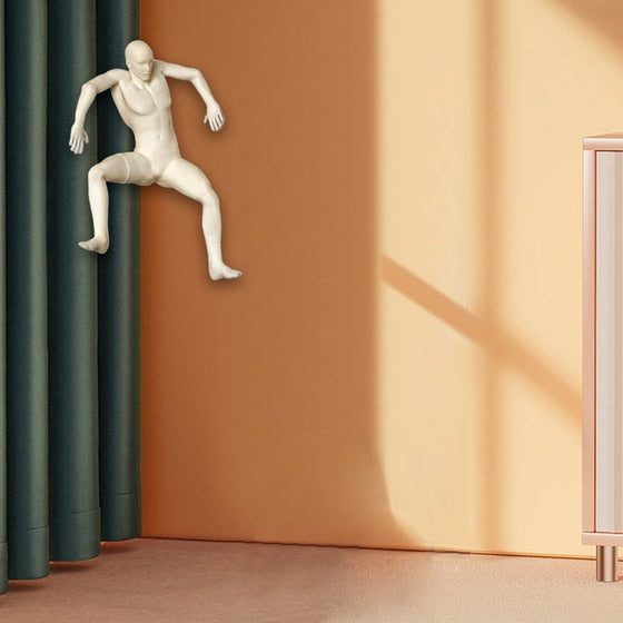 "Erschrockene" Charakter-Wandskulptur-Kletterer